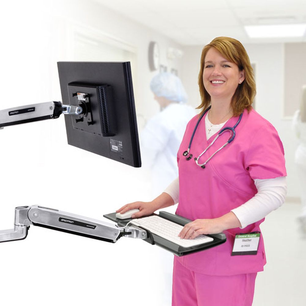Ergotron LX Sit-Stand PC Wall Mount System - Nurse using while standing