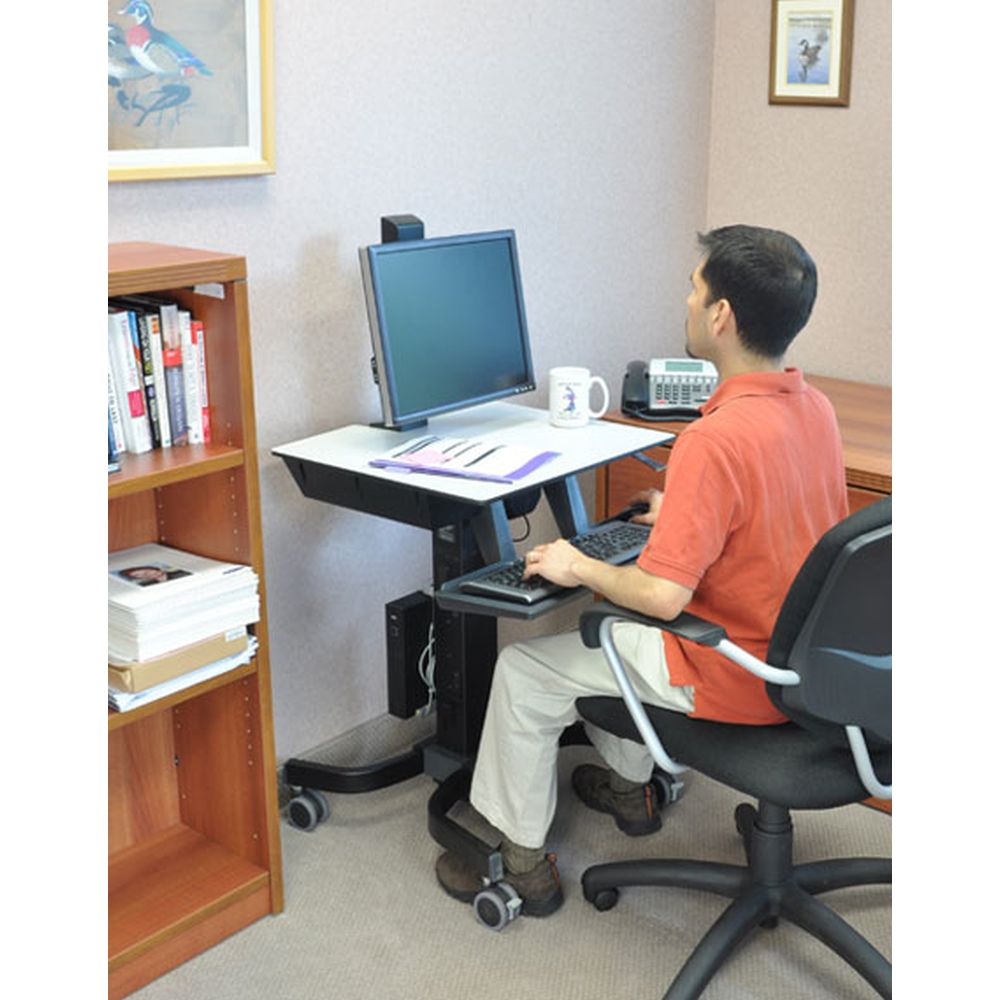 Ergotron WorkFit-C Single Sit-Stand Workstation Cart - Sitting Position In Office